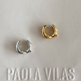Paola Vilas Earcuff Lou é um piercing escultural inspirado na icônica família Louise em prata 925 ou prata 925 com banho 18k. 