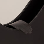 Paola_Vilas_Bolsa_escultura_corpo_feminino_preto